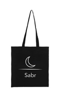 Islamische Baumwolltasche, stilvoll & bewusst Diese hochwertige Stofftasche (38 × 42 cm) mit langen Henkeln vereint Funktionalität mit einem minimalistischen, islamischen Design.